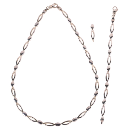 1693 - A sterling silver oval link chain necklace and bracelet set, necklace 42cm, bracelet 16cm, 44.2g tot... 