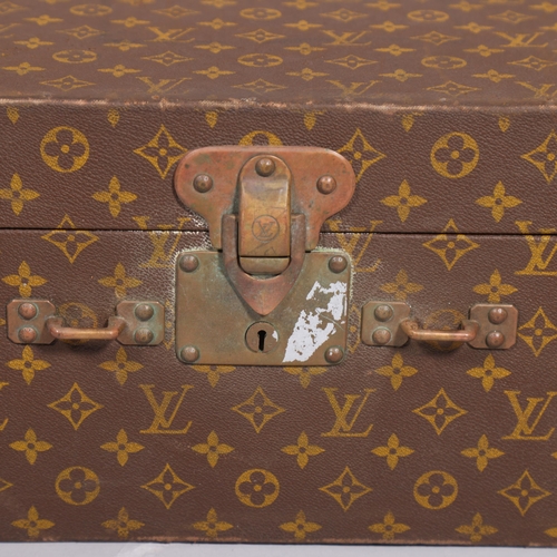 166 - LOUIS VUITTON - hard suitcase/trunk with monogram fabric cover, strapping to corners and brass locks... 