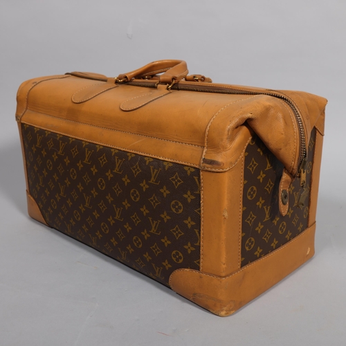 169 - LOUIS VUITTON - Gladstone style bag with monogrammed fabric and tan leather, circa 1980s, brown cott... 