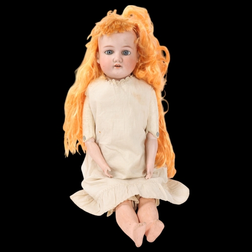 175 - A late 19th/early 20th continental century porcelain-head doll, with porcelain arms and legs hinged ... 