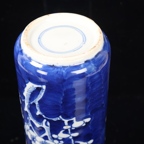 179 - A Chinese blue and white cylinder vase with prunus decoration, height 25.5cm