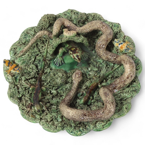 181 - A Victorian Palissy Ware dish by Jose A Cuna/Caldas Rulha, depicting snakes lizards and butterflies,... 