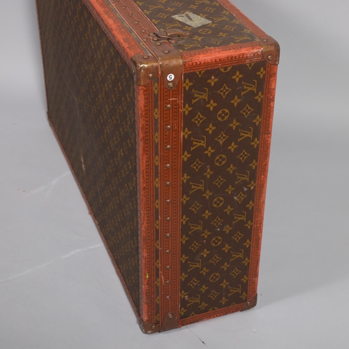 165 - LOUIS VUITTON - hard suitcase/trunk with monogram fabric cover and straps to edges and brass mounts ... 