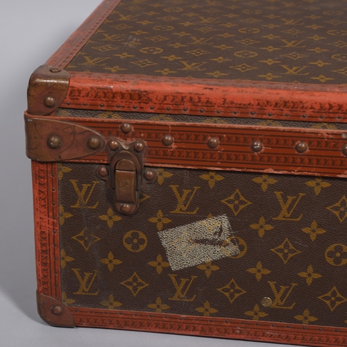 165 - LOUIS VUITTON - hard suitcase/trunk with monogram fabric cover and straps to edges and brass mounts ... 