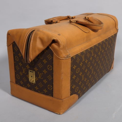 169 - LOUIS VUITTON - Gladstone style bag with monogrammed fabric and tan leather, circa 1980s, brown cott... 