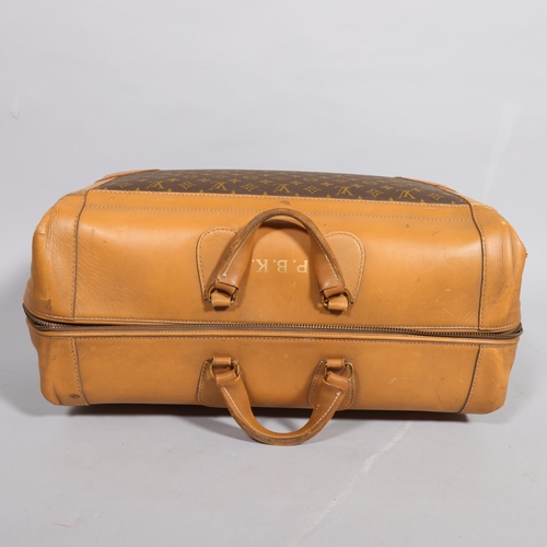 169 - LOUIS VUITTON - Gladstone style bag with monogrammed fabric and tan leather, circa 1980s, brown cott... 