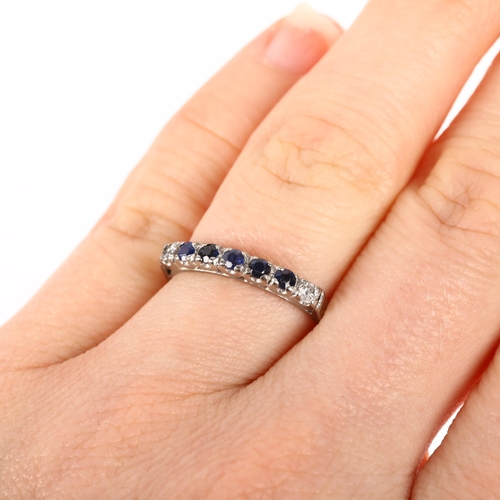 1382 - A mid-20th century 9ct white gold seven stone sapphire and diamond half hoop ring, set with round-cu... 