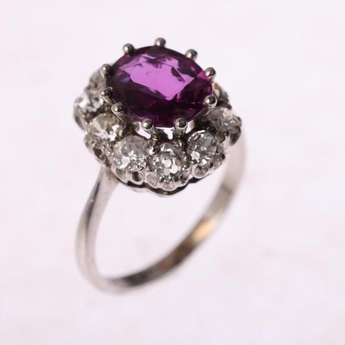 1406 - A platinum synthetic ruby and diamond flowerhead cluster ring, claw set with oval mixed-cut syntheti... 