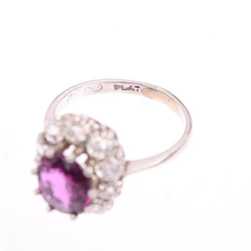 1406 - A platinum synthetic ruby and diamond flowerhead cluster ring, claw set with oval mixed-cut syntheti... 