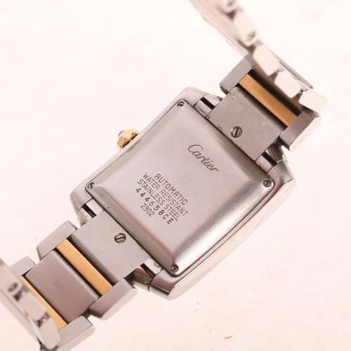 1005 - CARTIER - a bi-metal Tank Francaise automatic calendar bracelet watch, ref. 2302, silvered engine tu... 