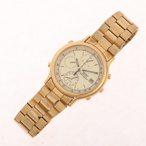 1026 - SEIKO - a gold plated stainless steel quartz chronograph calendar bracelet watch, ref. 7T32-6A5A, ch... 