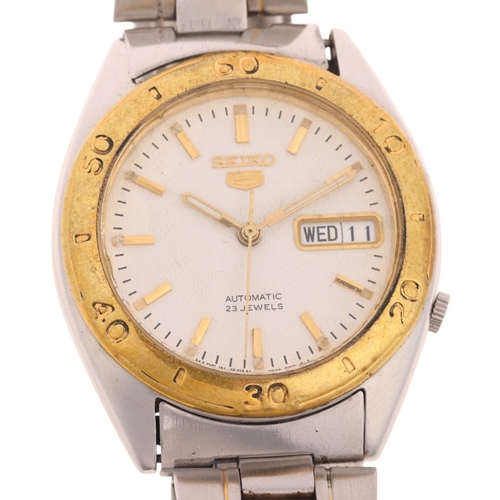 1028 - SEIKO 5 - a gold plated stainless steel automatic day/date bracelet watch, ref. 7S36-3250, white dia... 