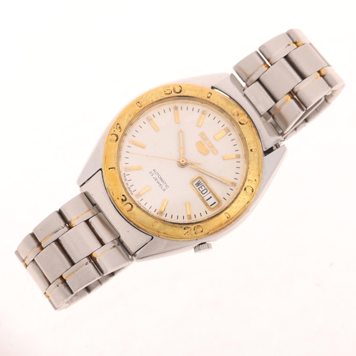 1028 - SEIKO 5 - a gold plated stainless steel automatic day/date bracelet watch, ref. 7S36-3250, white dia... 