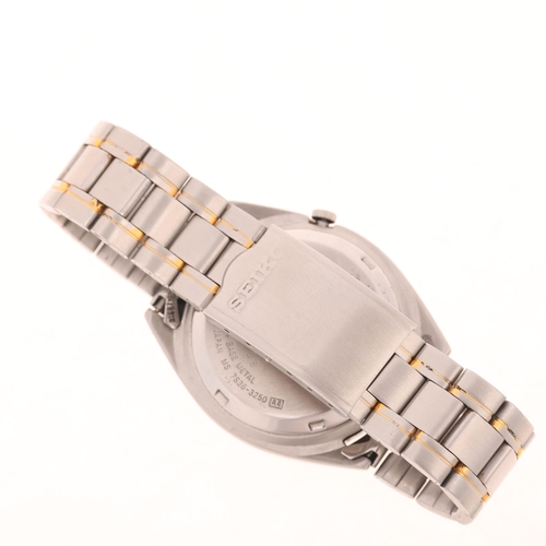 1028 - SEIKO 5 - a gold plated stainless steel automatic day/date bracelet watch, ref. 7S36-3250, white dia... 