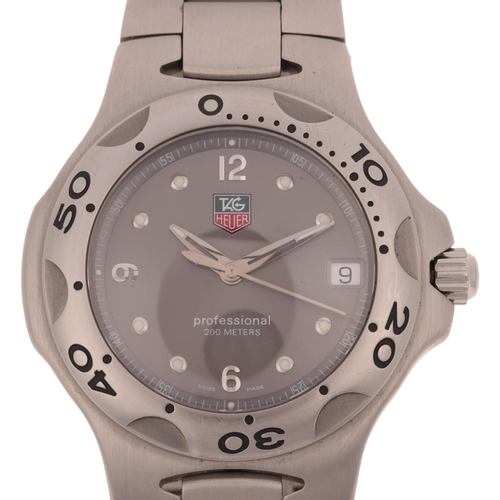 1037 - TAG HEUER - a stainless steel Kirium Professional 200M quartz calendar bracelet watch, ref. WL1111-0... 