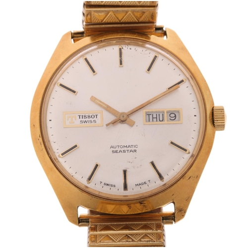 1041 - TISSOT - a Vintage gold plated stainless steel Seastar automatic calendar bracelet watch, ref. 46598... 