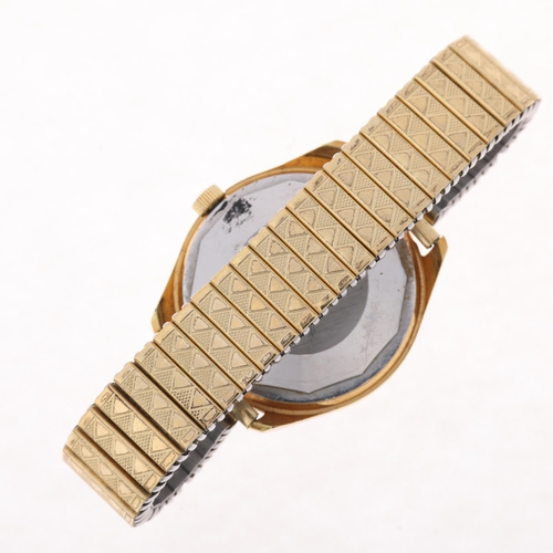 1041 - TISSOT - a Vintage gold plated stainless steel Seastar automatic calendar bracelet watch, ref. 46598... 