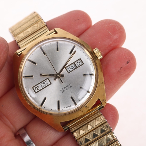 1041 - TISSOT - a Vintage gold plated stainless steel Seastar automatic calendar bracelet watch, ref. 46598... 