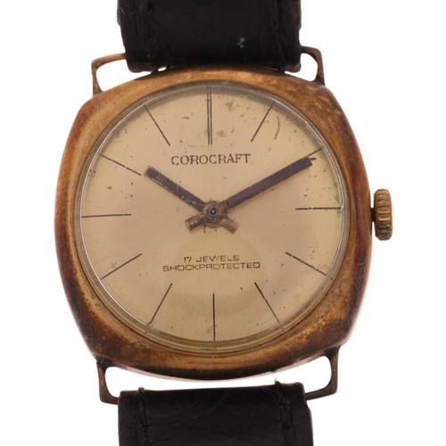 1042 - COROCRAFT - a 9ct gold cushion cased mechanical wristwatch, circa 1930s, champagne dial with black p... 