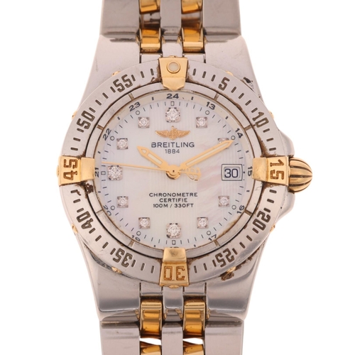 1056 - BREITLING - a lady's bi-metal Starliner quartz calendar bracelet watch, ref. B71340, mother-of-pearl... 