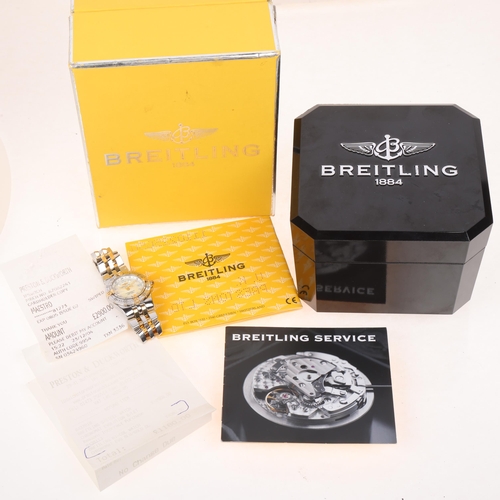 1056 - BREITLING - a lady's bi-metal Starliner quartz calendar bracelet watch, ref. B71340, mother-of-pearl... 