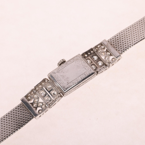 1058 - An Art Deco lady's French platinum diamond mechanical cocktail wristwatch, circa 1930s, silvered dia... 