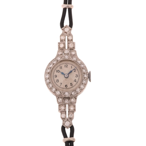 1060 - A lady's Art Deco platinum diamond mechanical cocktail wristwatch, circa 1930s, silvered dial with b... 