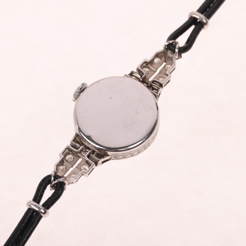 1060 - A lady's Art Deco platinum diamond mechanical cocktail wristwatch, circa 1930s, silvered dial with b... 