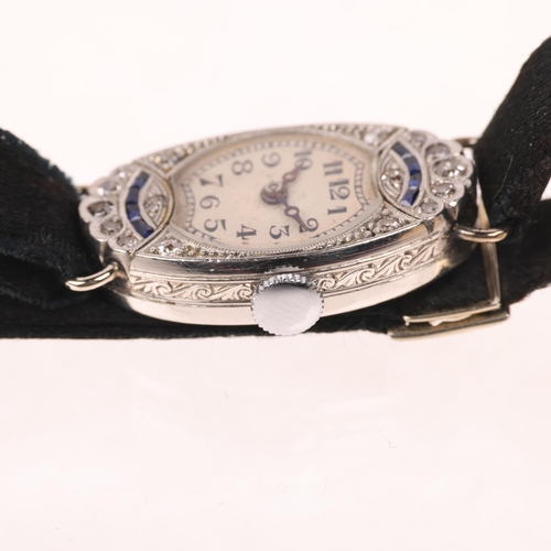 1061 - A lady's Art Deco platinum sapphire and diamond mechanical cocktail wristwatch, circa 1930s, silvere... 