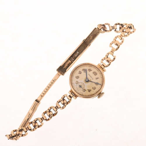 1063 - MARVIN - a lady's Vintage 9ct gold mechanical bracelet watch, circa 1960s, silvered dial with applie... 