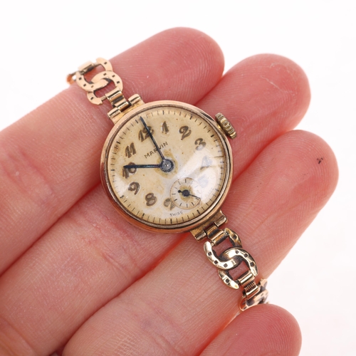 1063 - MARVIN - a lady's Vintage 9ct gold mechanical bracelet watch, circa 1960s, silvered dial with applie... 