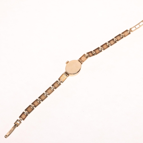 1065 - ROTARY - a lady's 9ct gold mechanical bracelet watch, circa 1960s, silvered brushed dial with applie... 