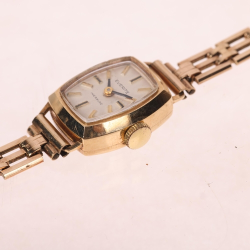 1066 - EVERITE - a lady's 9ct gold mechanical??/quartz?? bracelet watch, circa 1960s, silvered dial with ap... 