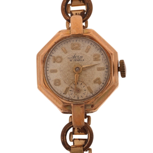 1068 - AVIA - a lady's Vintage 9ct gold mechanical bracelet watch, circa 1950s, silvered engine turned dial... 