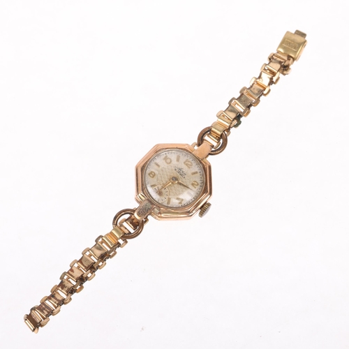 1068 - AVIA - a lady's Vintage 9ct gold mechanical bracelet watch, circa 1950s, silvered engine turned dial... 