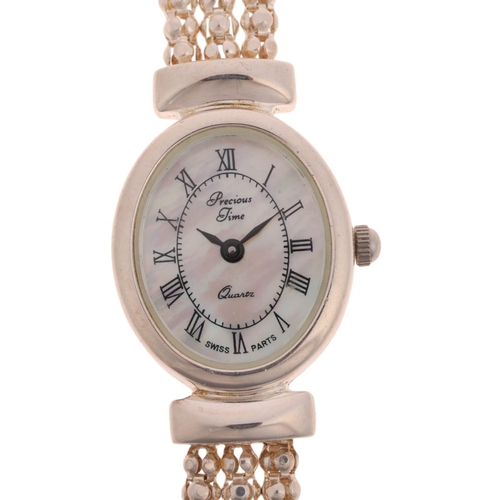 1073 - PRECIOUS TIME - a lady's stainless steel quartz bracelet watch, mother-of-pearl dial with Roman nume... 