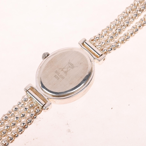 1073 - PRECIOUS TIME - a lady's stainless steel quartz bracelet watch, mother-of-pearl dial with Roman nume... 