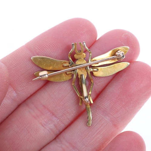 1152 - An Antique 14ct gold pearl garnet and enamel dragonfly brooch, circa 1910, realistically modelled wi... 