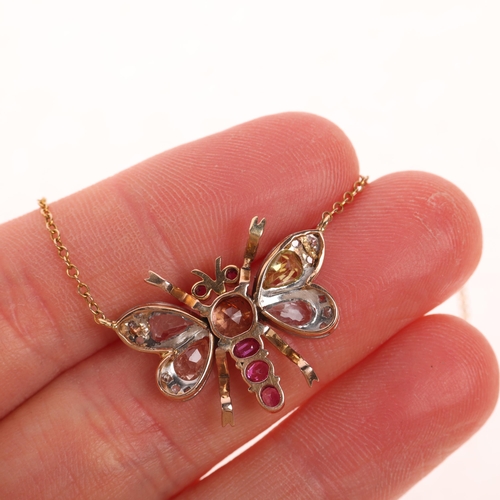 1153 - An Antique gem set dragonfly pendant necklace, circa 1910, set with various gemstones including brow... 