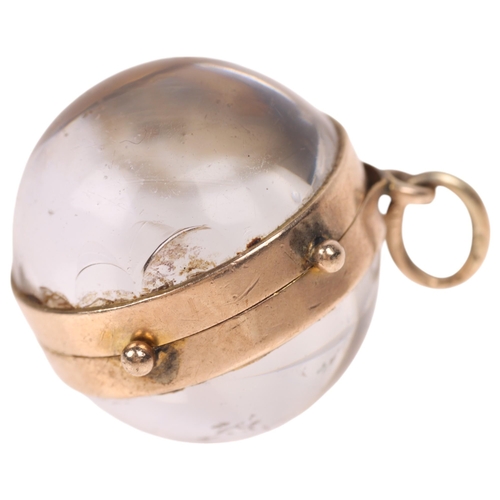 1155 - An Antique Victorian 9ct gold rock crystal 'Pool of Light' orb locket pendant, set with 2 hemisphere... 