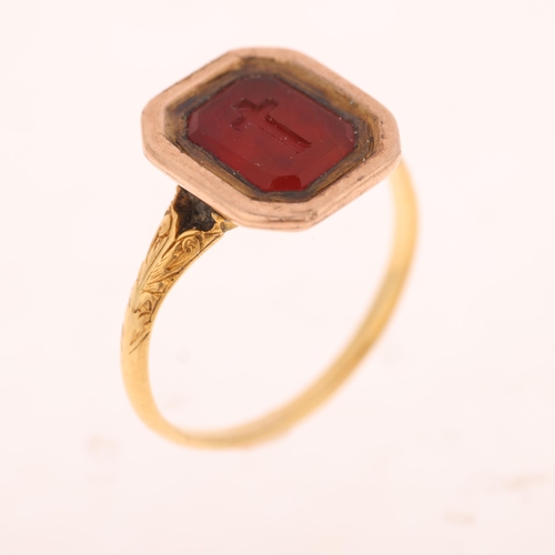 1159 - An Antique Victorian carnelian 'Cross' seal ring, the octagonal intaglio carved with religious cross... 