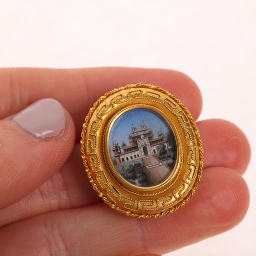 1175 - An Antique Indian 20ct gold miniature watercolour 'Gate to the Taj Mahal' dress stud, the oval panel... 