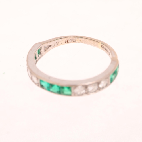 1185 - An 18ct white gold emerald and diamond half eternity ring, maker HB&S, London 1974, channel set with... 