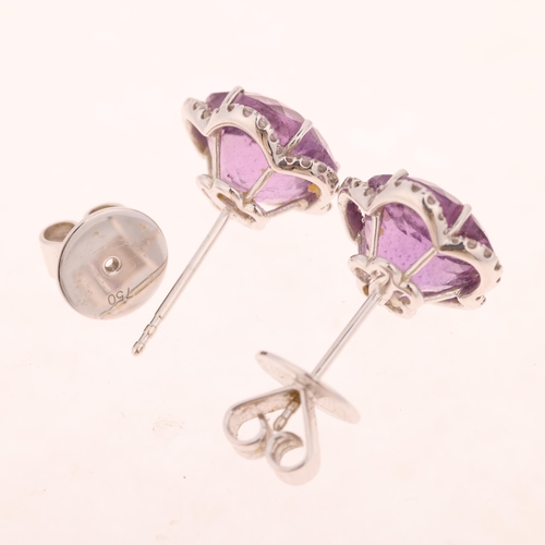 1190 - KIKI MCDONOUGH - a pair of 18ct white gold amethyst and diamond flowerhead stud earrings, each set w... 