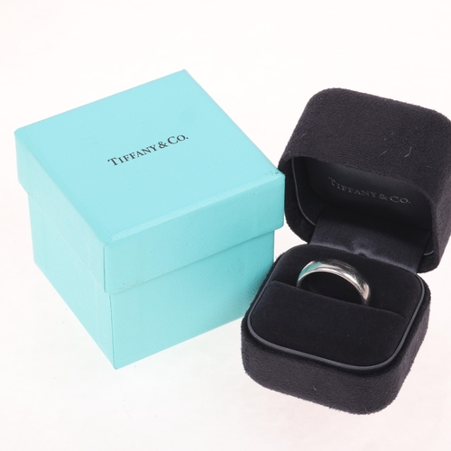 1194 - TIFFANY & CO - a platinum wedding band ring, maker T & Co, London 2016, plain D shape, signed Tiffan... 