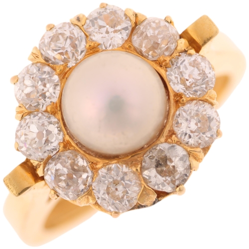 1200 - An 18ct gold whole button pearl and diamond flowerhead cluster ring, set with 6.9mm pearl surrounded... 