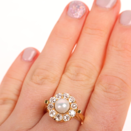 1200 - An 18ct gold whole button pearl and diamond flowerhead cluster ring, set with 6.9mm pearl surrounded... 