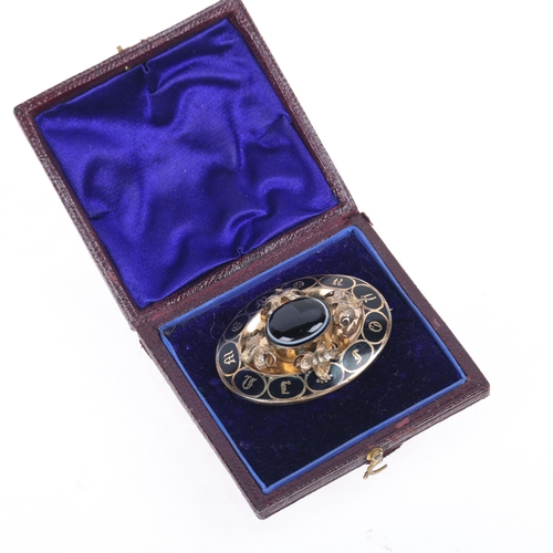 1204 - An Antique Victorian 9ct gold bullseye banded agate and enamel mourning brooch, circa 1860, of oval ... 