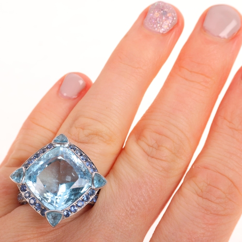 1206 - A large 18ct white gold blue topaz and sapphire cluster cocktail ring, set with square cushion and t... 