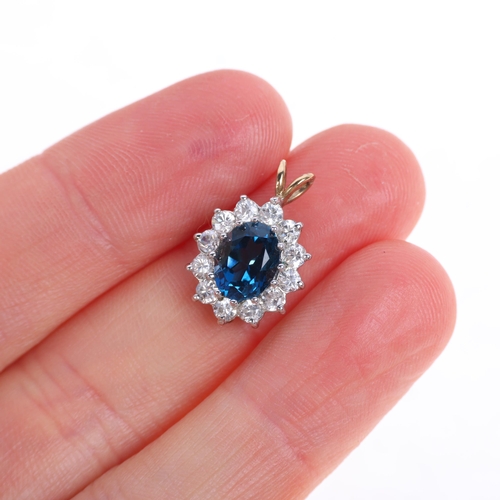 1207 - A 9ct gold blue topaz and cubic zirconia cluster pendant, set with oval mixed-cut topaz and round-cu... 